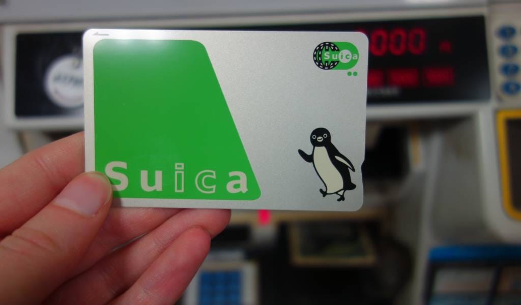 Welcome Suica card at Tokyo train station gate - easy transit payment for tourists